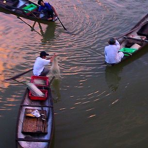 Fishing at dawn on the Perfume River